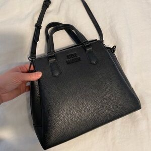 Steve Madden, faux leather crossbody clutch.